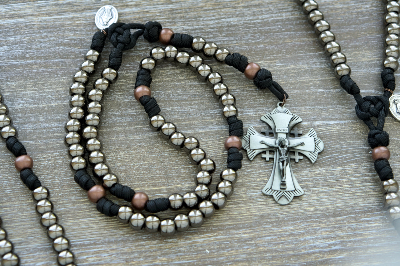 Durable, Premium Quality "Ancient Armor" 5 Decade Paracord Rosary with Large Gunmetal Beads, Antique Copper Our Father Beads, and Black Paracord, Featuring a Matching Grey Jerusalem Cross and Miraculous Medal Devotional Medal for Catholic Men's Spiritual Warfare.