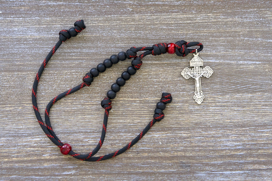 A beautifully crafted paracord rosary, designed to hang from your car's rearview mirror. Measuring approximately 9 inches when tightened and up to 13 inches in length.