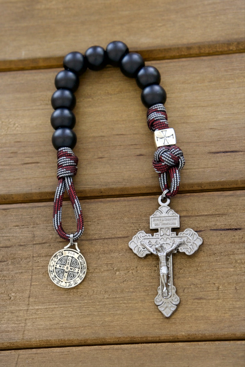 The Crusader - DEUS VULT! - Pocket Paracord Rosary: Empower your spiritual journey with this durable, premium paracord rosary featuring a 12mm metal alloy crusader Our Father bead, red and silver paracord for added strength, and St. Benedict devotional medal for protection. Trust in the unbreakable power of this Catholic gift as your spiritual weapon against evil.