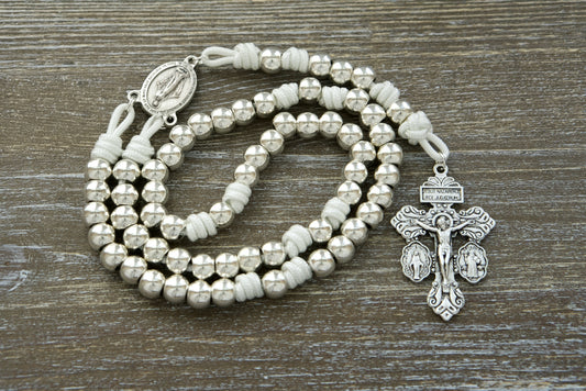 Divine Elegance - Miraculous Medal - Premium Paracord Rosary with Silver-Colored Beads and White Paracord, featuring a silver-colored 2" Pardon Crucifix and Miraculous Medal Centerpiece. Handcrafted with strength, durability and spiritual connection in mind.