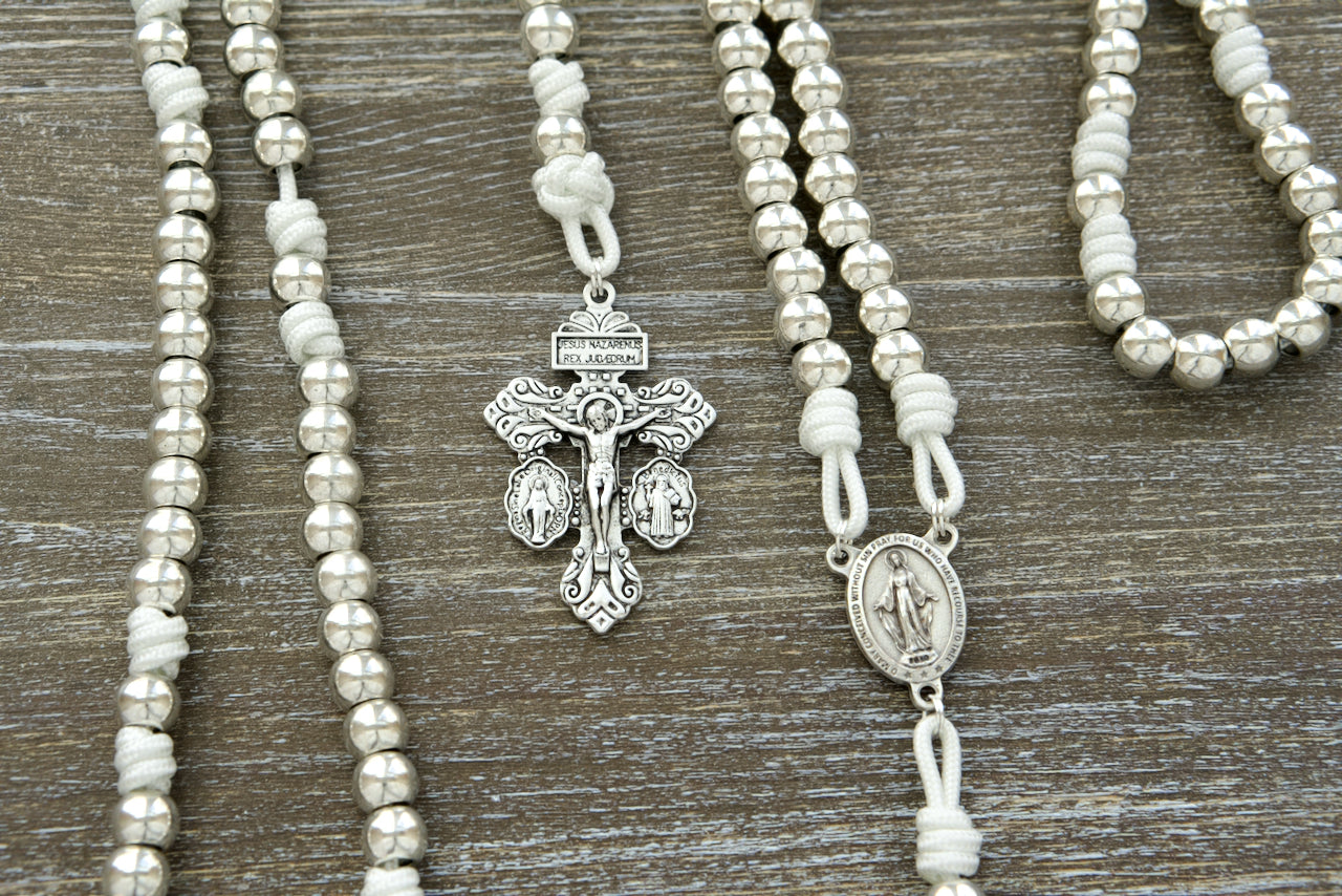 Divine Elegance - Miraculous Medal Paracord Rosary: Unbreakable white paracord, silver-colored beads and alloy metal accents with a Miraculous Medal centerpiece and 2" Pardon Crucifix.