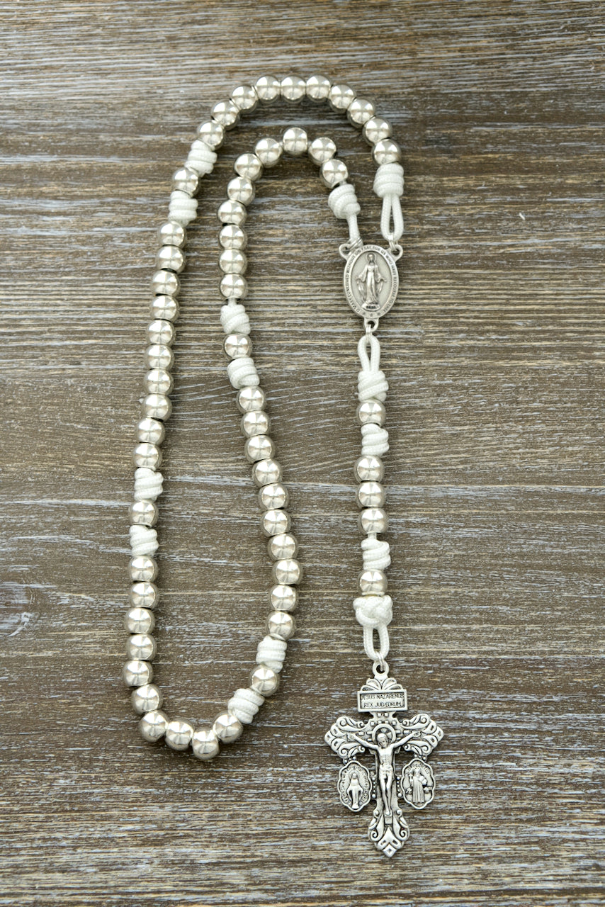 Premium paracord rosary - Divine Elegance Miraculous Medal rosary handcrafted with durable 10mm alloy metal beads, white paracord 275 and a powerful silver Miraculous medal centerpiece for your spiritual connection. Shop now on SanctusServo.com