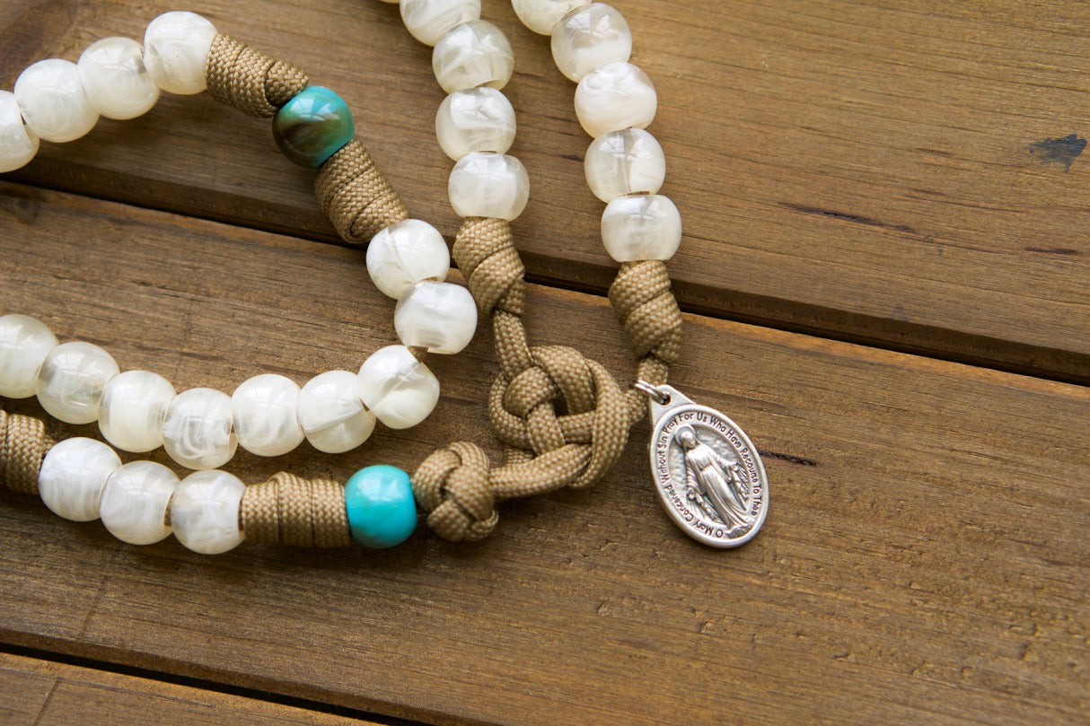 Divine Hope - Brown, Teal, and Cream 5 Decade Paracord Rosary with Miraculous Medal and St. Benedict Crucifix. Durable, premium paracord rosary for spiritual warriors. Ideal Catholic gift.