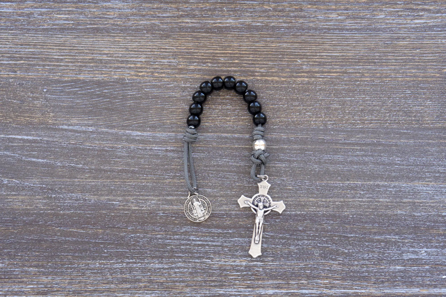 Duty Bound Holy Rosary with premium metal beads and paracord string in navy, black, or gray options.