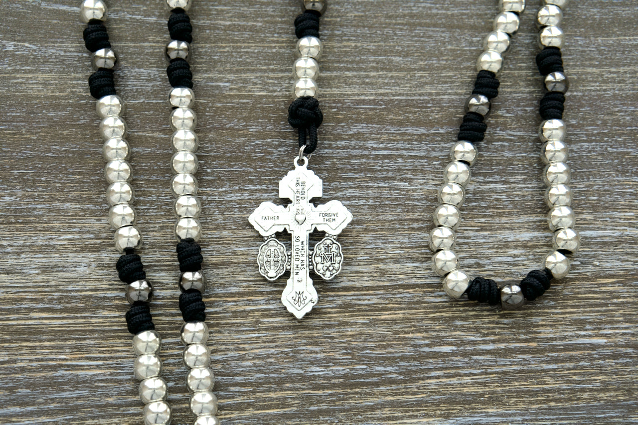 New 7 Sorrows Servite Rosary - Premium Black Paracord, Silver Hail Mary Beads, Gunmetal Our Father Beads, Mater Dolorosa Centerpiece, and 2" Pardon Crucifix. Durable Catholic gift for prayer and devotion.