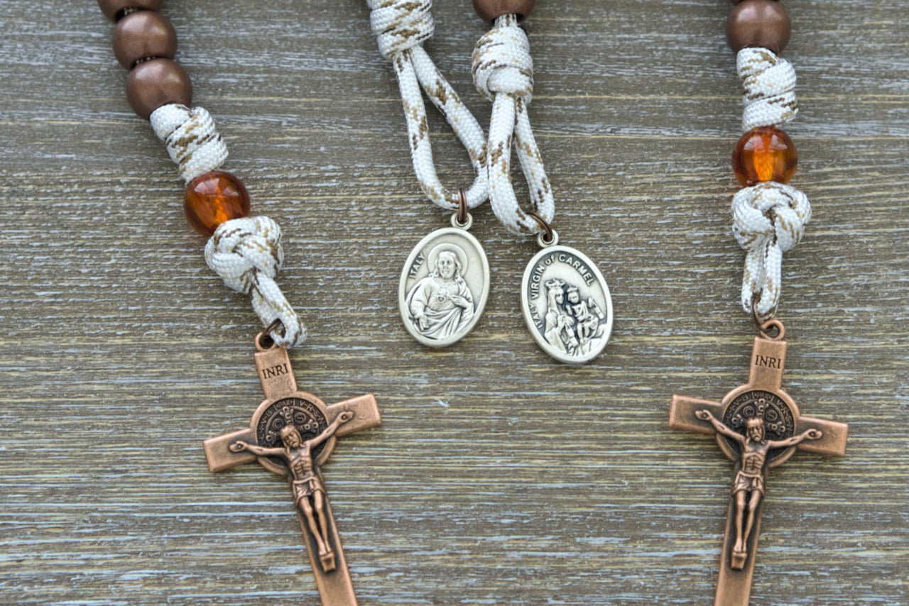 Our Lady of Mount Carmel Pocket Paracord Rosary - Handcrafted with durable white paracord and antique copper Hail Mary beads, featuring a transparent copper Our Father bead and captivating copper St. Benedict crucifix. Premium Catholic gift for devotion to Our Lady of Mount Carmel.
