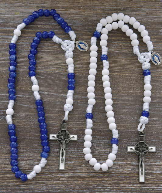 Our Lady's Mantle" 5 Decade Paracord Rosary: Two stylish options featuring white paracord, blue enamel Miraculous Medal, and a white enamel St. Benedict crucifix.  Handmade with durable 12mm matte white and milky "miraculous blue" acrylic beads for enhanced devotion during prayer and spiritual warfare.