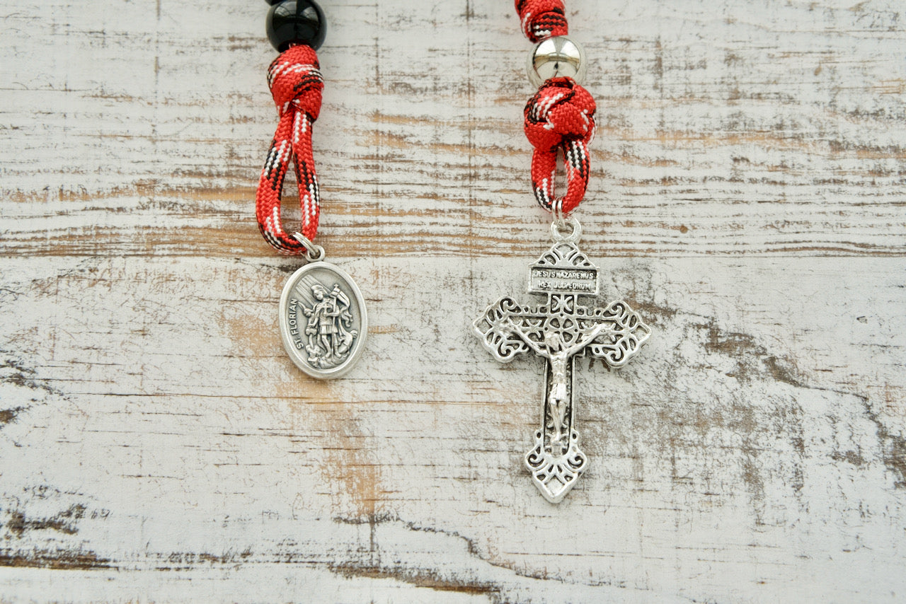 Discover the ultimate spiritual weapon for firefighters, EMS professionals, and first responders with our St. Florian's Strength 1 Decade Rosary - a durable and powerful prayer accessory designed to withstand life's toughest battles! Shop premium quality Catholic gifts at Sanctus Servo now.