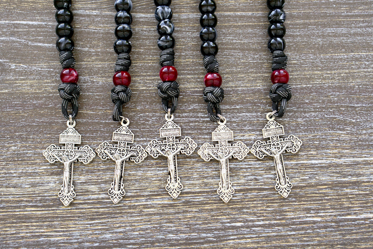 Terror of Demons - St. Joseph - Pocket Paracord Rosary with black/white luster Hail Mary beads, red/maroon Our Father bead, St. Joseph and St. Benedict medals, and a 2 inch Pardon Crucifix on paracord 550.