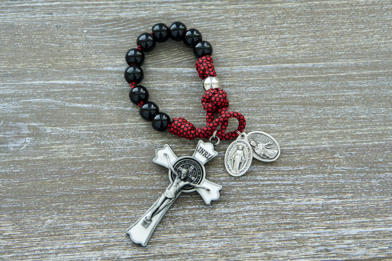 Militia Immaculatae - St. Maximilian Kolbe - Red, White and Black Signature Paracord Rosary with St. Maximilian Kolbe and Miraculous Medals, Premium Black Hail Mary Beads, Silver Our Father Beads, Large White Enamel St. Benedict Crucifix, 9 Inch Length - Sanctus Servo