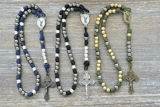 Black, blue, or green paracord chaplet with silver St. Michael medal centerpiece and 10mm metal alloy beads.