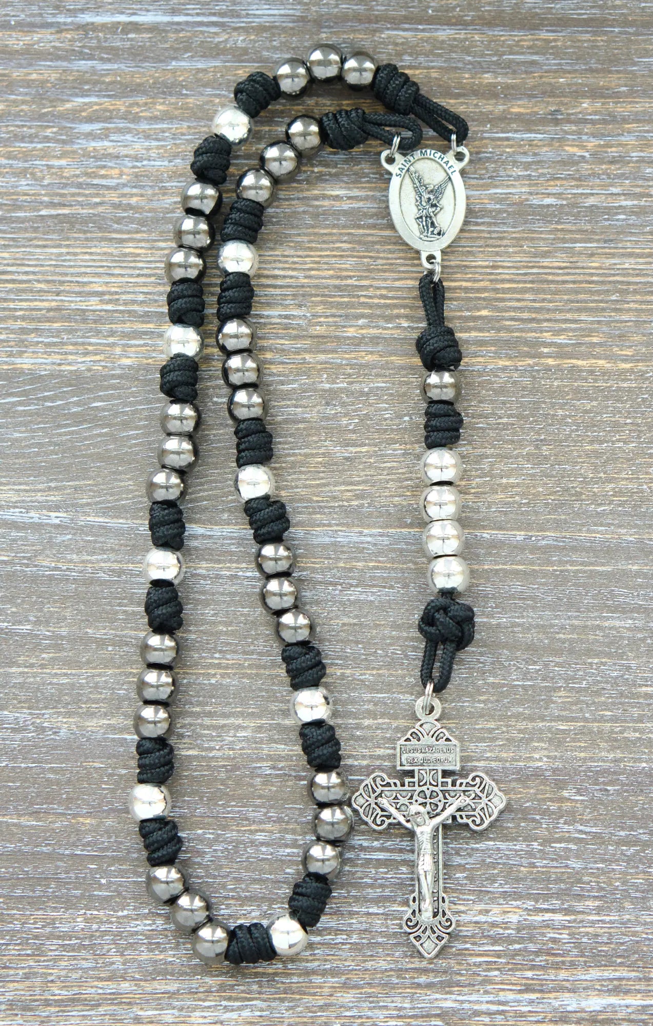 Black, blue, or green St. Michael paracord chaplet featuring silver St. Michael medal and 10mm metal alloy beads, pardon crucifix.