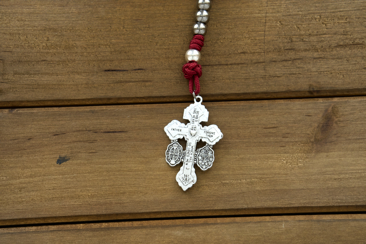 Maroon paracord rosary with gunmetal and silver beads, St. Benedict medal, and 2-inch Pardon crucifix – "Sword of the Faithful" spiritual protection.