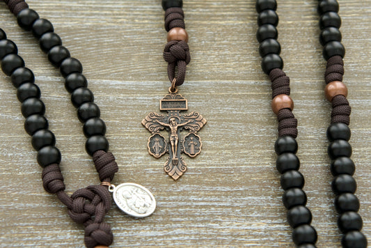 The Franciscan Forge - St. Francis 5 Decade Paracord Rosary: Handcrafted with unwavering dedication, featuring durable brown paracord and antique copper Our Father beads, ideal for spiritual growth and resilience in faith.