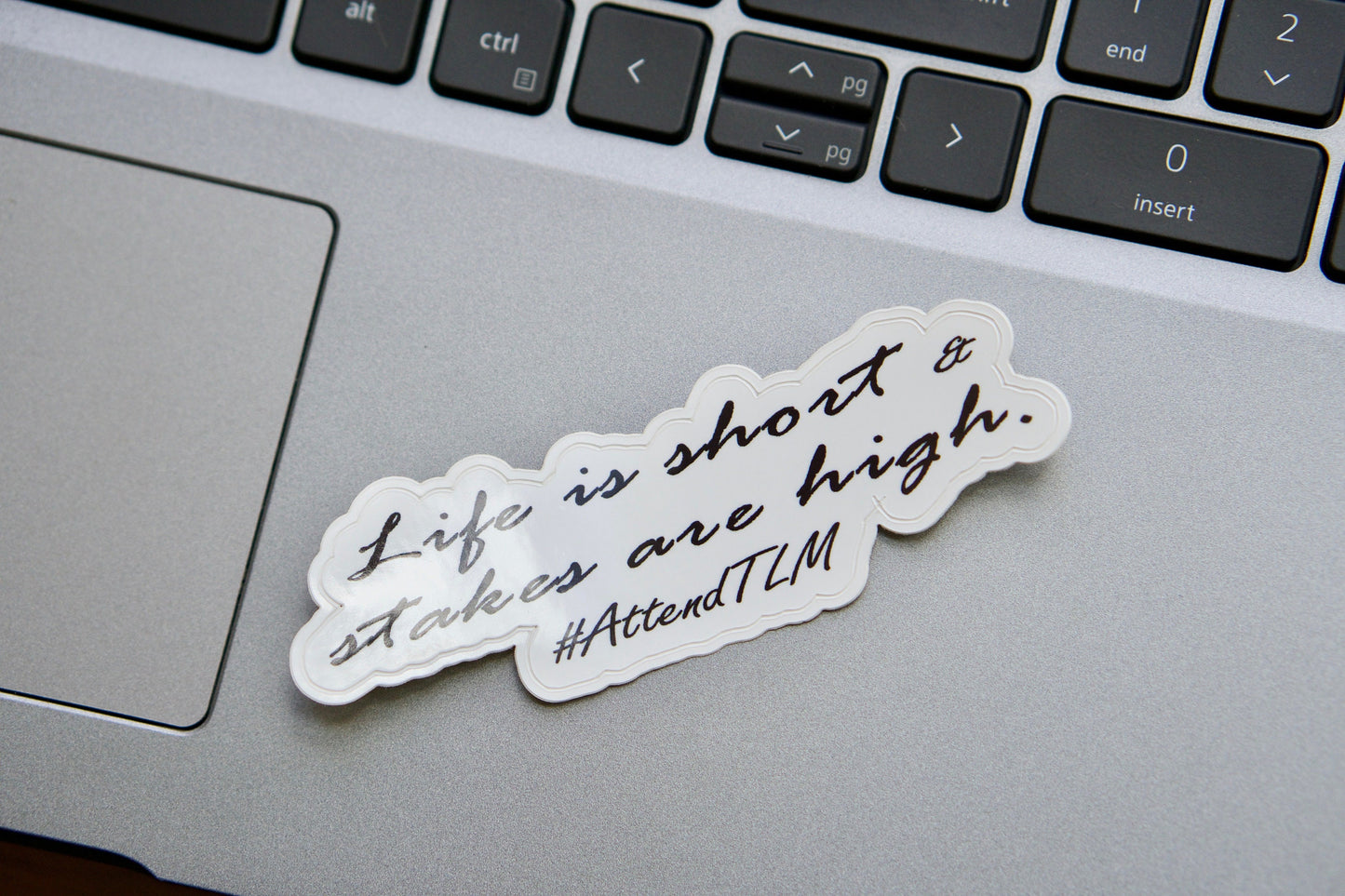 Spread the Traditional Latin Mass message with our Life is Short, Stakes are High vinyl sticker - perfect for laptops, water bottles, or notebooks.