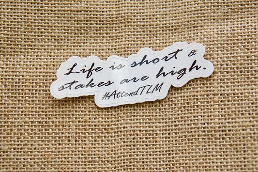 Embrace tradition and attend the Traditional Latin Mass - show your devotion with our 4" x 1" Life is short, stakes are high vinyl sticker. Perfect for laptops, water bottles, or notebooks.