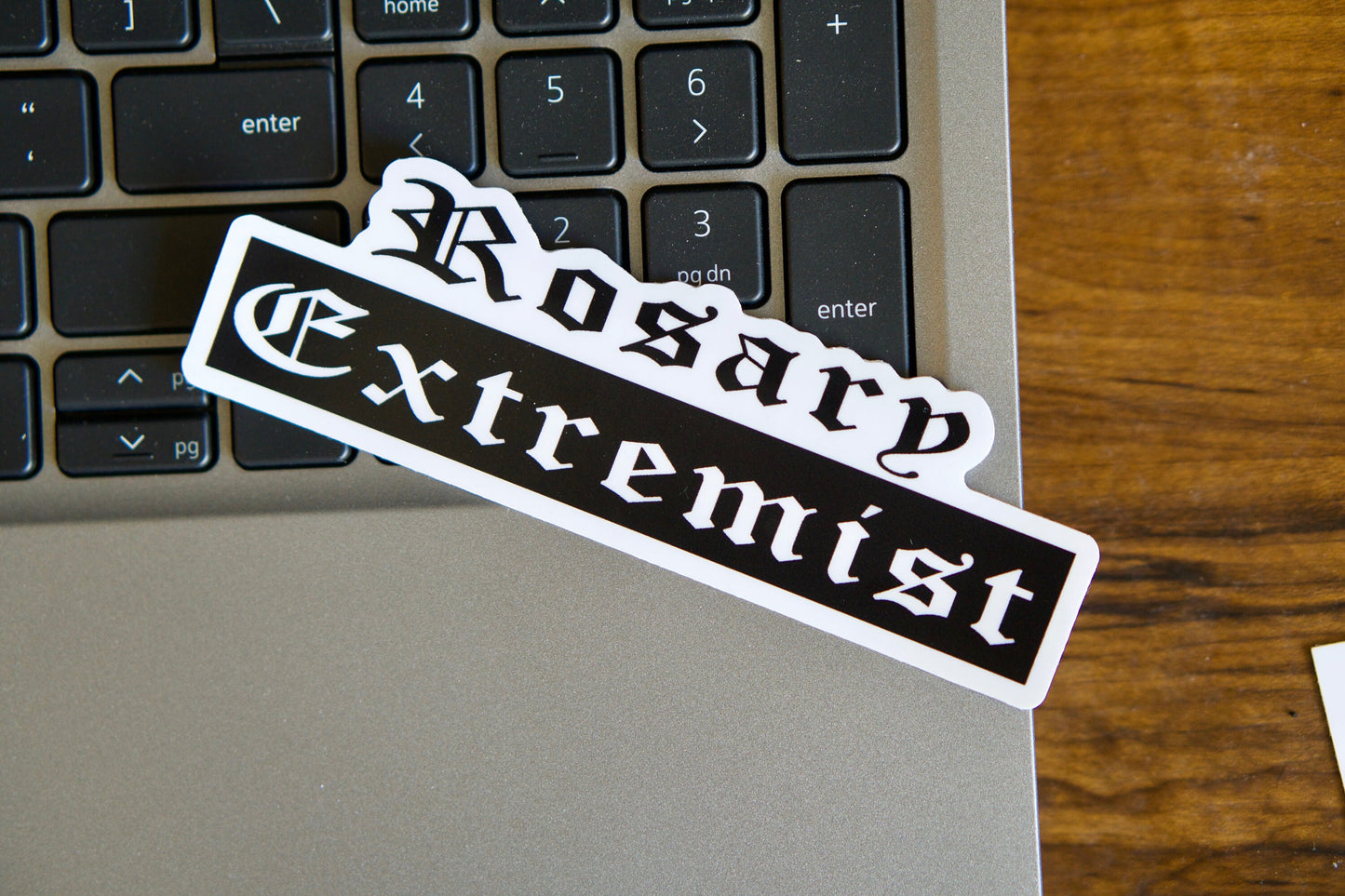 Join the ranks of the Rosary Extremist with this bold vinyl sticker! A perfect reminder for Catholic warriors to stay on fire for their faith. Pair it with our custom rosaries for maximum impact and unwavering devotion.