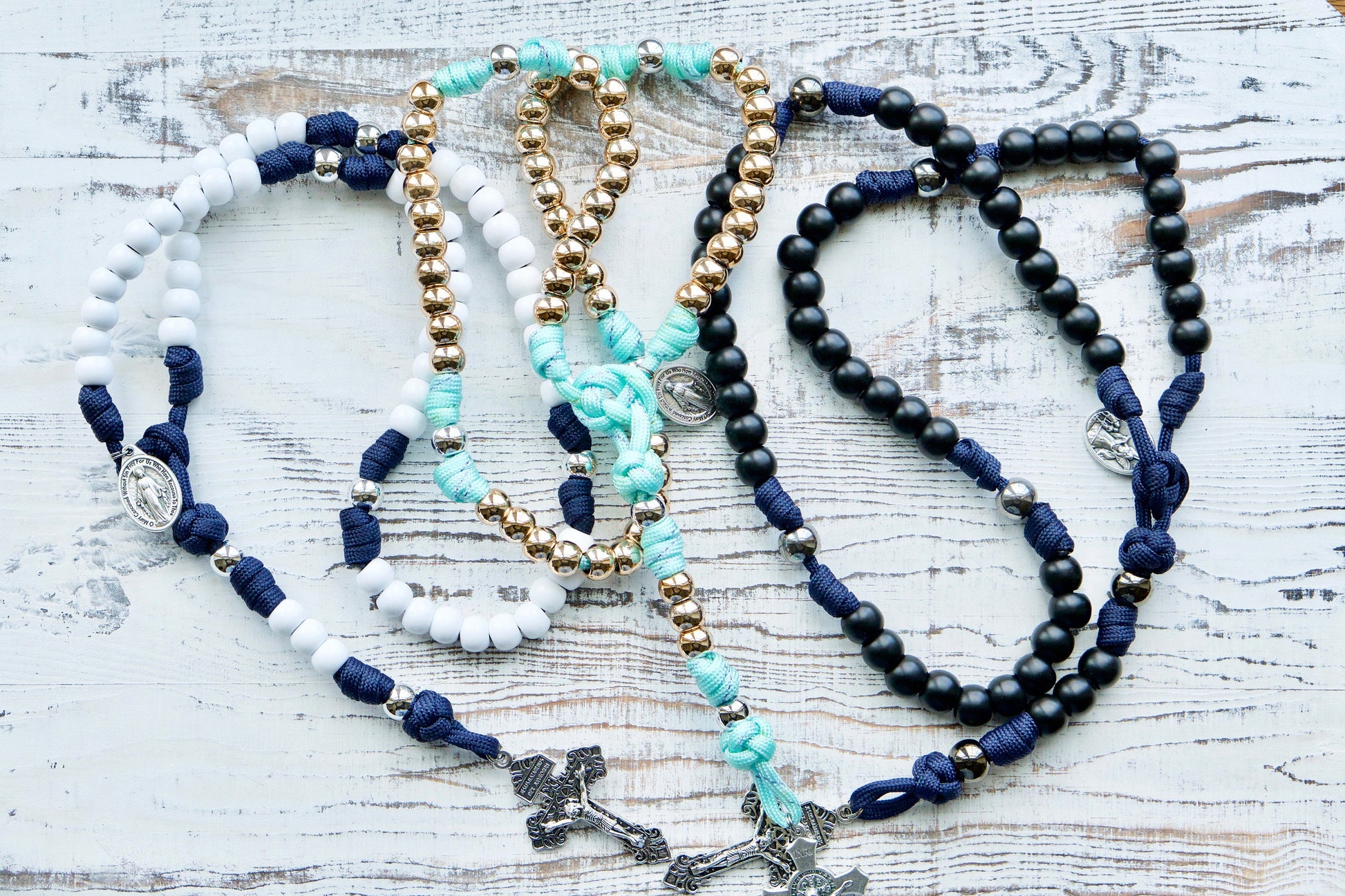 Customize your own 5 Decade Paracord Rosary with unique design options for a personal touch! Contact us today to bring your vision to life, perfect for a special gift or personal devotion. Shop now at Sanctus Servo.