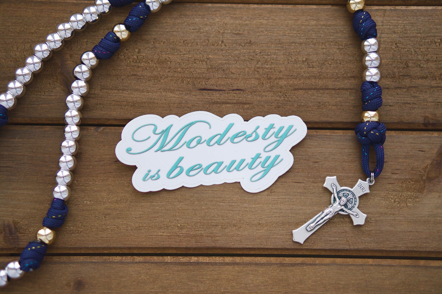 4" x 2" Modesty is Beauty vinyl sticker promoting the importance of modesty as true beauty, perfect for laptops, water bottles, notebooks, or stocking stuffers.