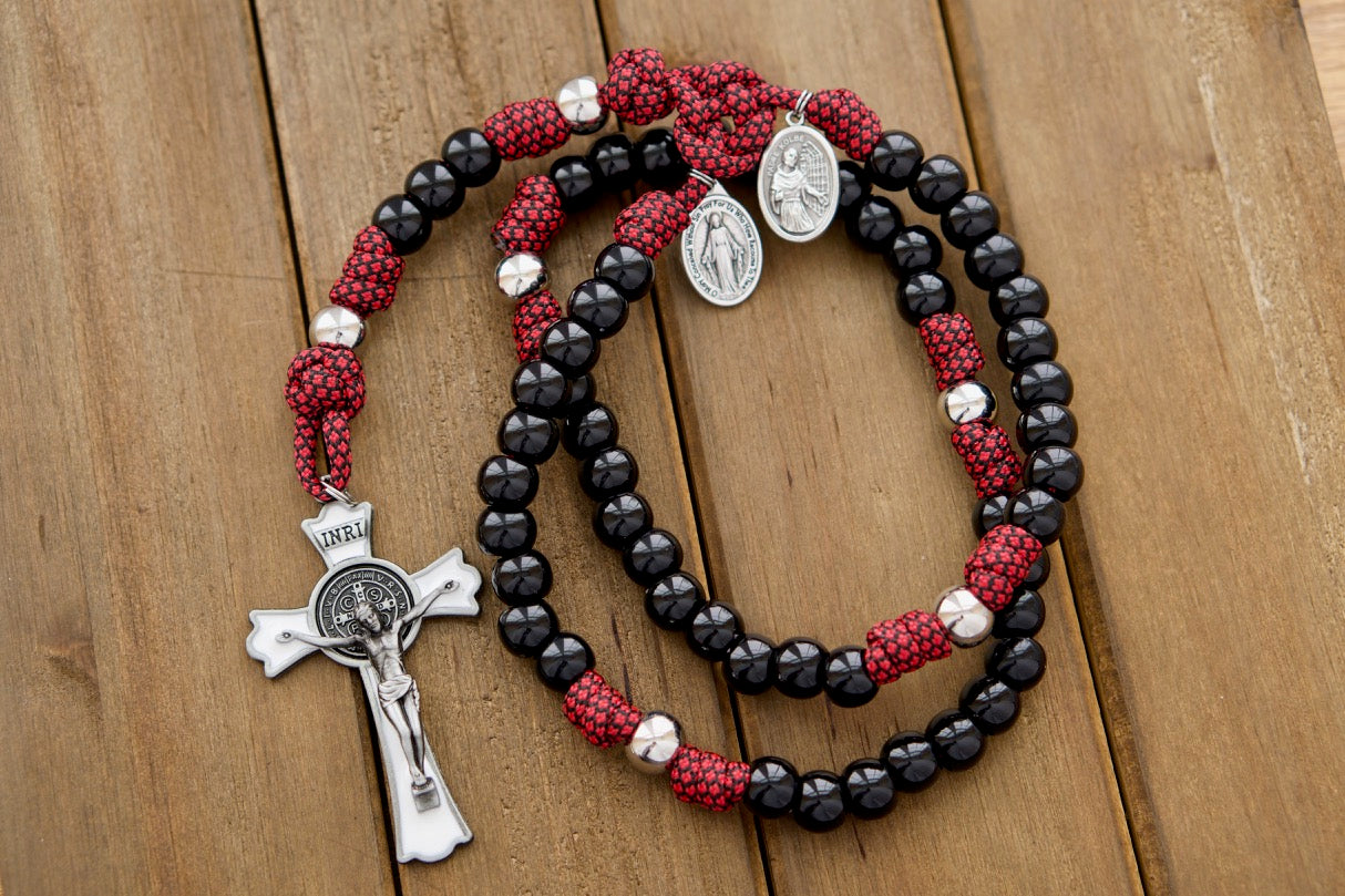 Militia Immaculatae - St. Maximilian Kolbe Paracord Rosary in Red, White, and Black with Signature 5 Decade Design, featuring a large enamel St. Benedict Crucifix and Miraculous Medal and St. Kolbe Medal, perfect for prayerful battles, handmade by a devout Catholic family, durable and unbreakable, guaranteed to last.