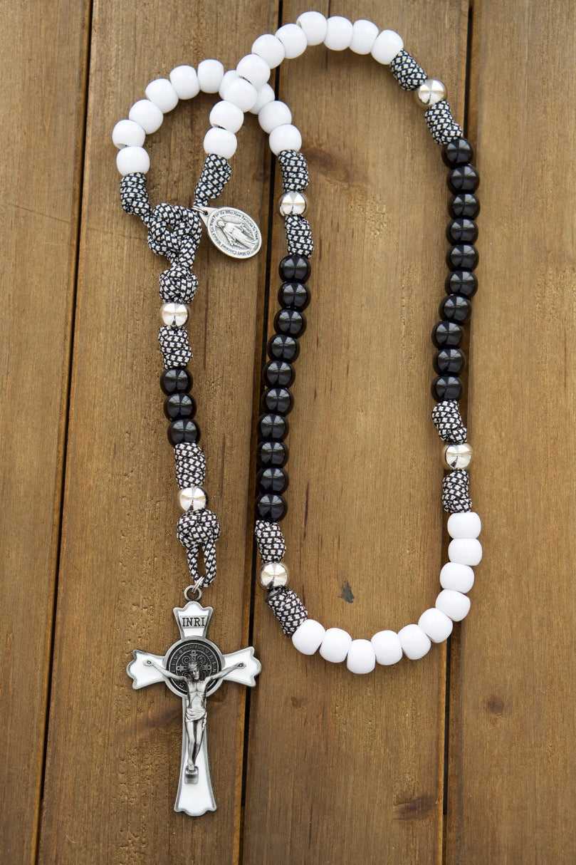 Two elegant 5-decade rosaries in black and white paracord, with St. Benedict crucifixes and Miraculous Medals, perfect for a Catholic wedding gift to strengthen love and faith.