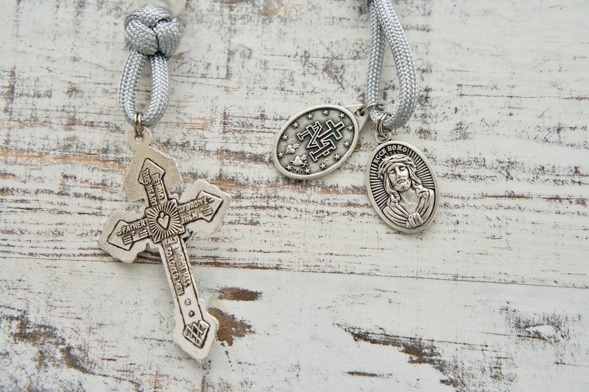 Mater Dolorosa - Our Lady of Sorrows - 7 Sorrows Pocket Paracord Rosary with silver 2" Pardon Crucifix, Miraculous Medal, and Mater Dolorosa/Ecce Homo Medal. Handcrafted by a small Catholic family for durable, unbreakable use in prayer and battle.