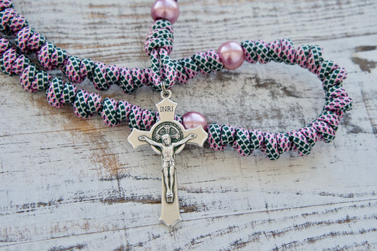 Embrace the beauty of springtime with this stunning pink and green knotted paracord rope rosary - the perfect Catholic gift for modern women! This durable and unbreakable paracord rosary features a snakeskin patterned rope, pink Our Father beads, St. Benedict Crucifix, and Miraculous Medal, making it an essential spiritual weapon to conquer life's battles.
