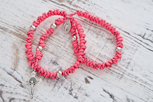 The Family Protector - Pink and Silver Knotted Rope Rosary, a sturdy and stylish spiritual weapon featuring a St. Benedict Crucifix and Miraculous Medal devotional medal, made of Paracord 550 rope with acrylic accent beads, perfect for intense prayer and meditation on-the-go.
