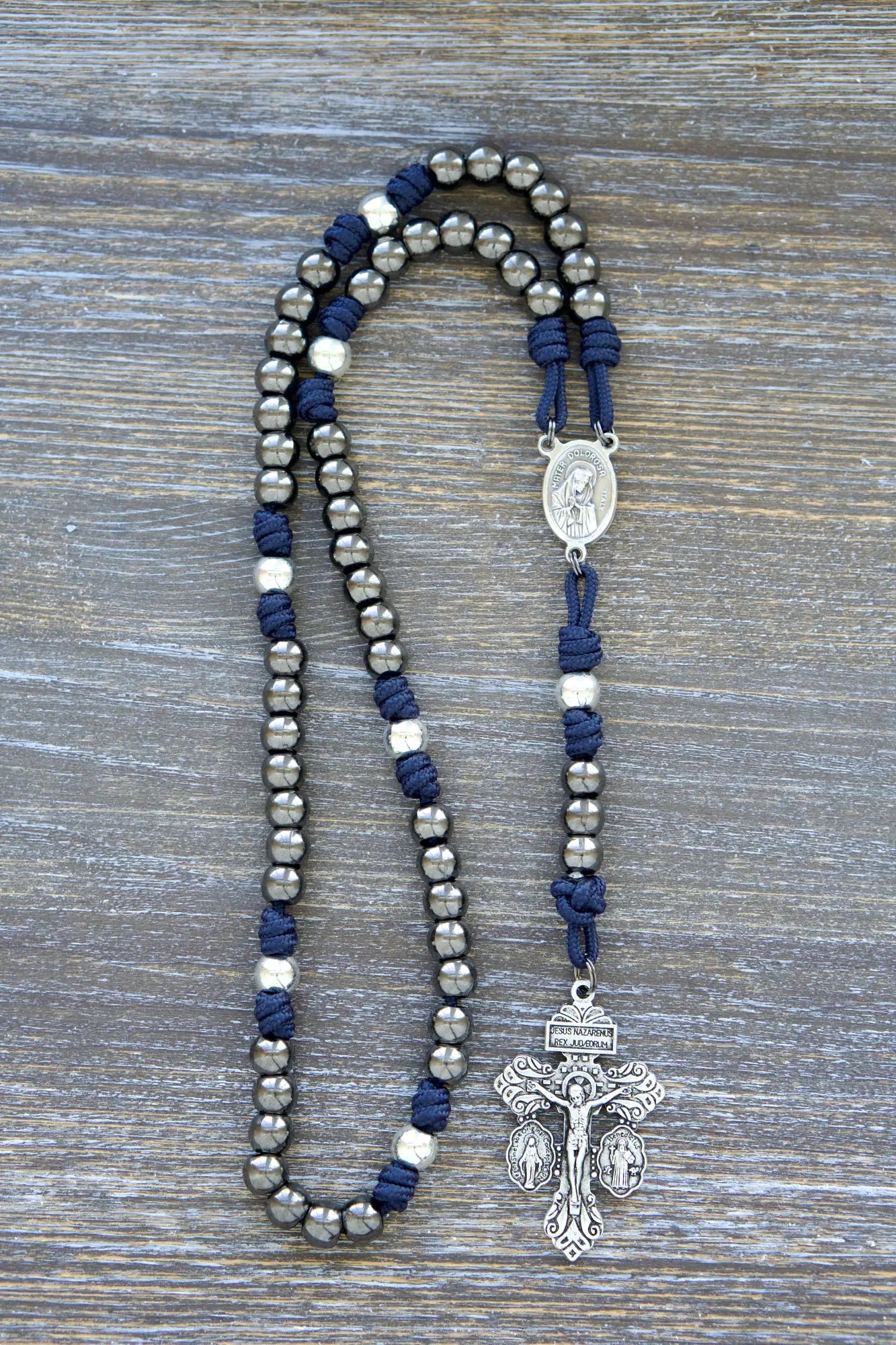 Seven Sorrows Servite Rosary chaplet: gunmetal metal beads (10mm), Mater Dolorosa centerpiece, triple crucifix on paracord in navy blue cord