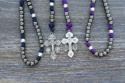 7 Sorrows Servite Rosary with Mater Dolorosa centerpiece, 10mm metal beads, paracord, and 2" Pardon Crucifix in white, black, navy, or purple.