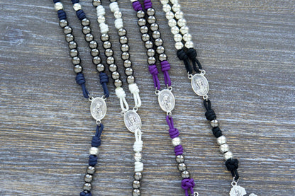 7 Sorrows Servite Rosary chaplet with gunmetal 10mm metal beads, Mater Dolorosa centerpiece, and 2" Triple Threat Pardon Crucifix in navy blue paracord.  