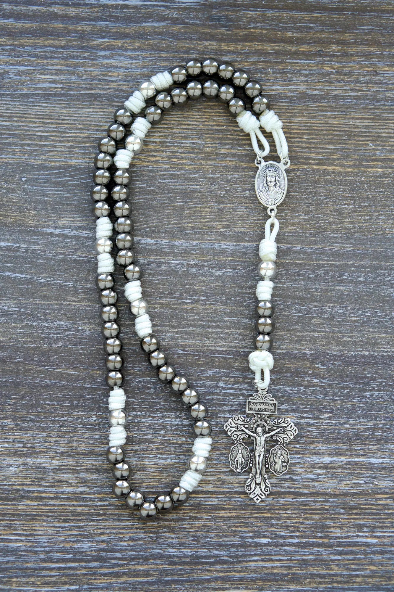 7 Sorrows Servite Rosary with Mater Dolorosa centerpiece and 2" Pardon Crucifix on paracord, 10mm metal beads in gunmetal/silver.
