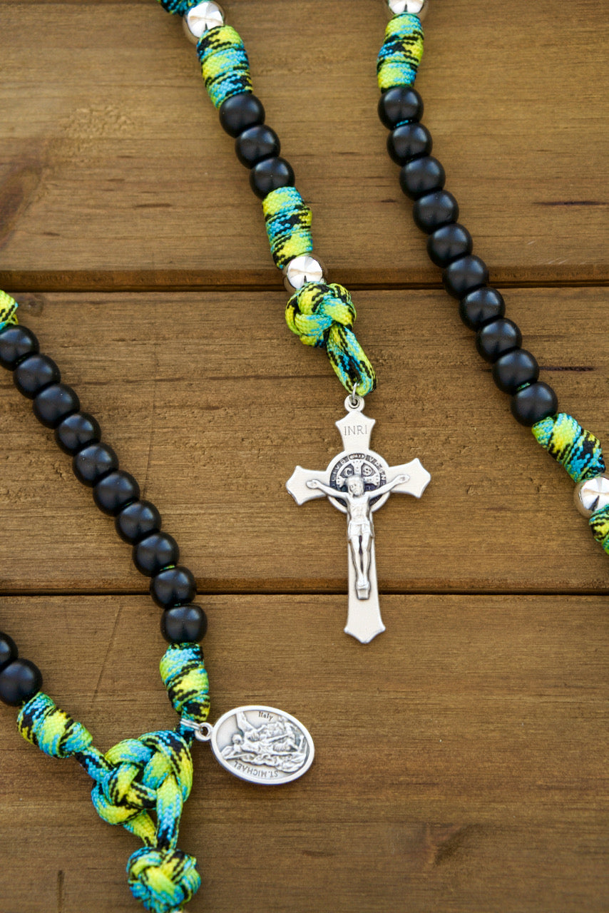 Adventure Awaits - Green, Black and Silver - 5 Decade Paracord Rosary for Catholic Boys, featuring high-quality paracord 550, durable St. Benedict crucifix, and powerful intercessors St. Michael and Guardian Angel. Perfect for faith-fueled expeditions and spiritual growth.