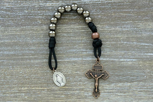 Ancient Armor - Pocket Paracord Rosary: Durable, premium unbreakable paracord rosary with large gunmetal Hail Mary beads, antique copper Our Father beads, and black paracord for Catholic warriors. Includes a copper pardon crucifix and miraculous medal.