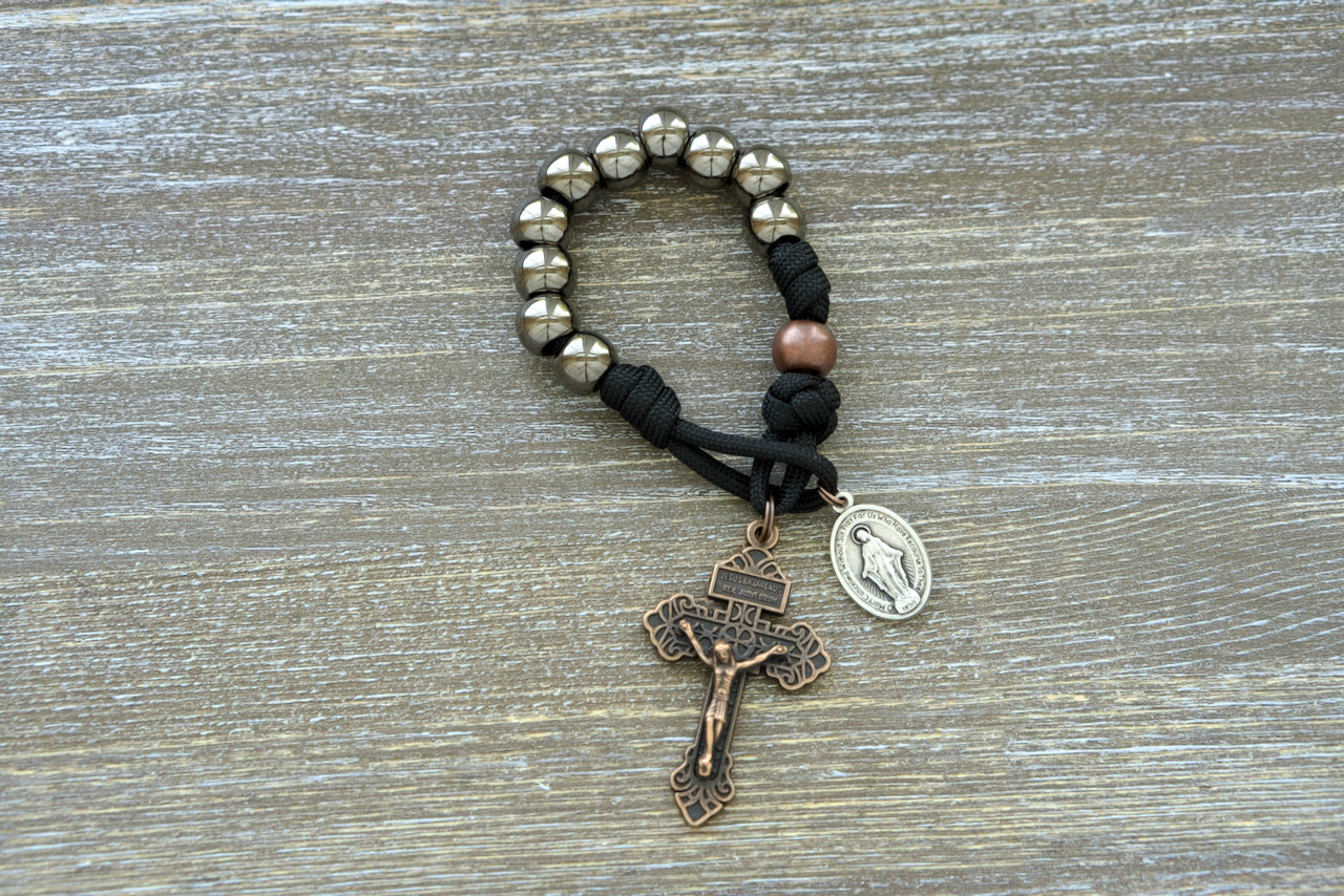 Ancient Armor - Pocket Paracord Rosary: Durable, premium unbreakable paracord rosary with large gunmetal Hail Mary beads, antique copper Our Father beads, copper pardon crucifix, and miraculous medal for Catholic warriors. 