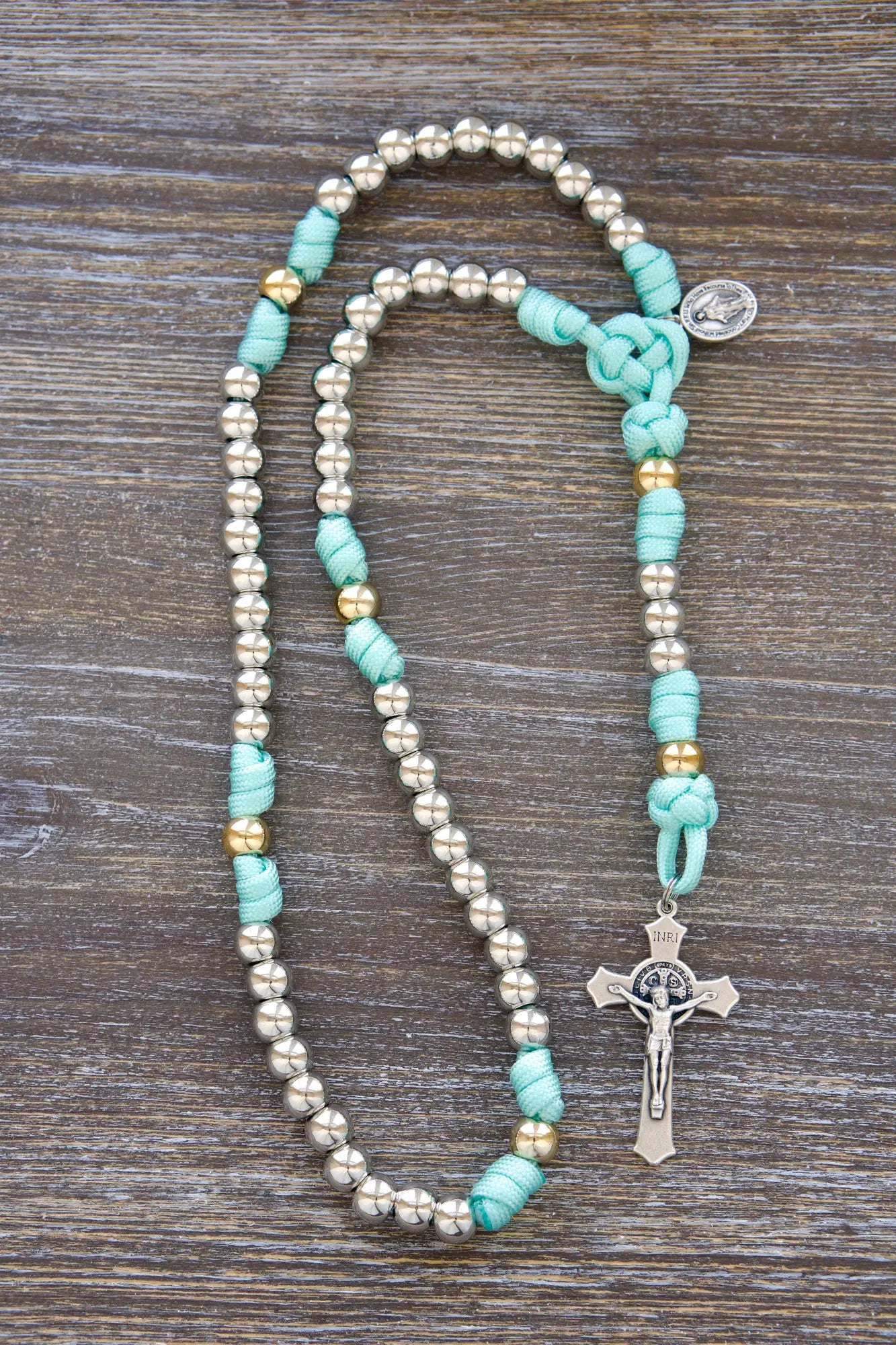 August Queen Rosary: 5-decade paracord design featuring a 2" St. Benedict crucifix for protection.