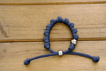 Navy Blue and Gunmetal Rosary Bracelet - Durable Paracord 550, Adjustable Design, Unbreakable Catholic Prayer Companion