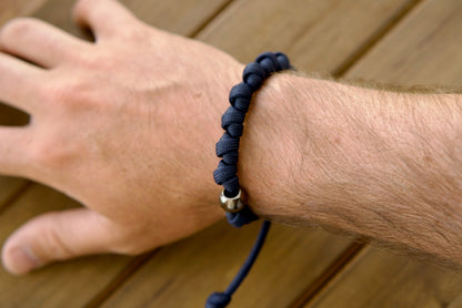 Navy Blue & Gunmetal Paracord Rosary Bracelet - Durable, Adjustable & Faithful Companion for Prayer on Your Spiritual Journey.