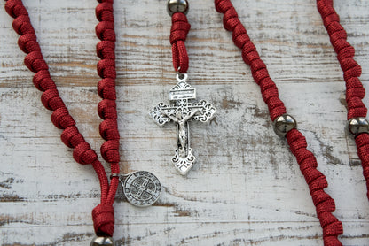 The Defender of Faith - Maroon and Gunmetal Knotted Rope Rosary: Protect your faith with this durable, premium unbreakable paracord rosary featuring St. Benedict. Ideal for spiritual warriors on the go!