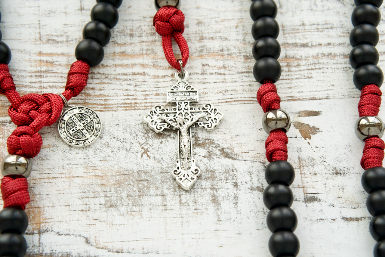Discover "The Defender of Faith" - A Durable & Unbreakable 5 Decade Maroon and Black Paracord Rosary. This Premium Catholic Gift is Perfect for Standing Strong in Your Devotion.