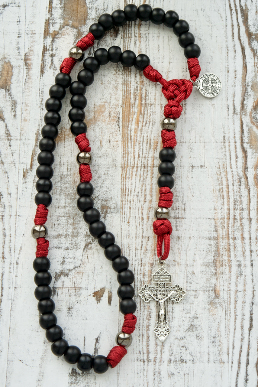 Strengthen your faith with "The Defender of Faith" - Maroon and Black 5 Decade Paracord Rosary. This durable Catholic gift features premium unbreakable paracord for a powerful, steadfast design to stand strong in life's battles.