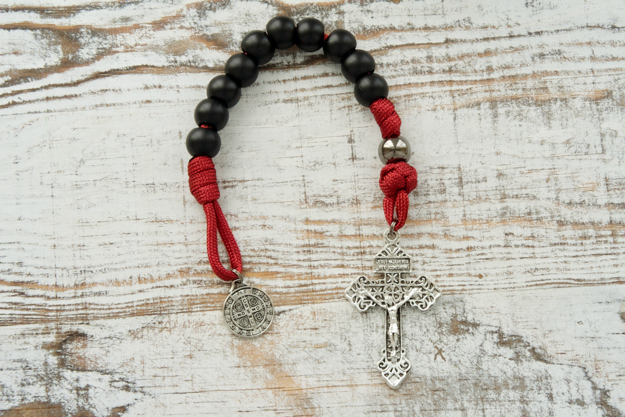 This premium unbreakable Catholic gift features a bold design with maroon rope, matte black Hail Mary beads, and striking gunmetal Our Father beads.