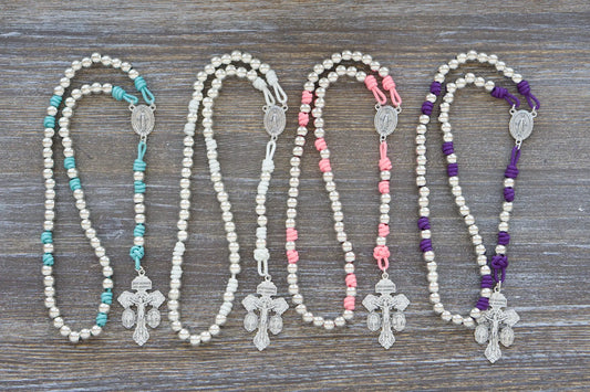 Premium metal paracord rosary for women available in 4 colors: teal, white, pink or purple with shiny silver metal beads.