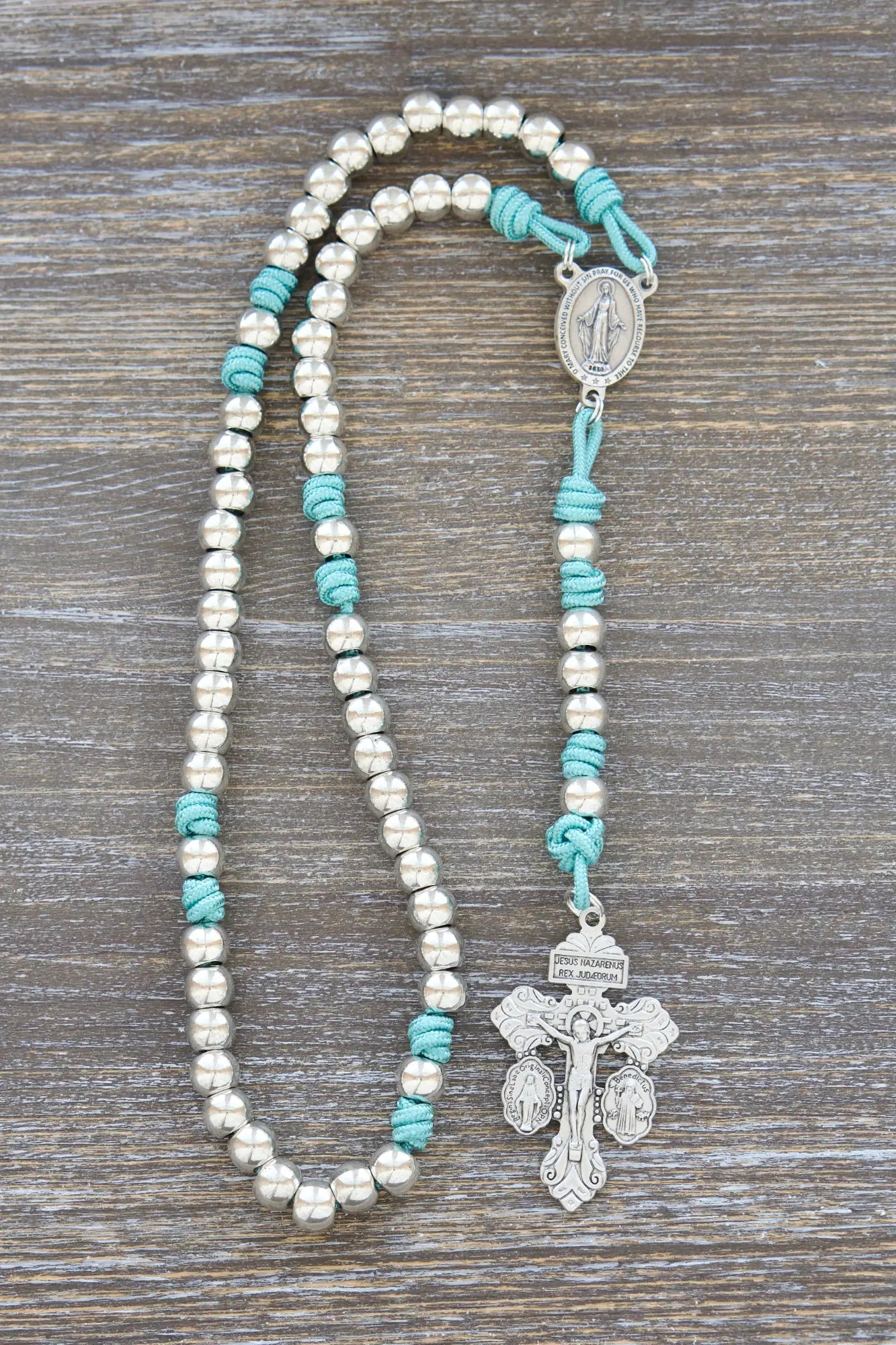 Divine Elegance premium metal paracord rosary in teal with shiny silver beads and paracord 275.