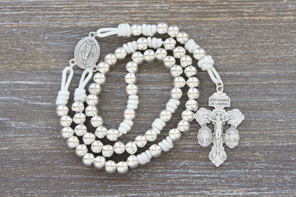 Premium metal paracord rosary with polished silver beads and crucifix, designed for spiritual elegance and durability.