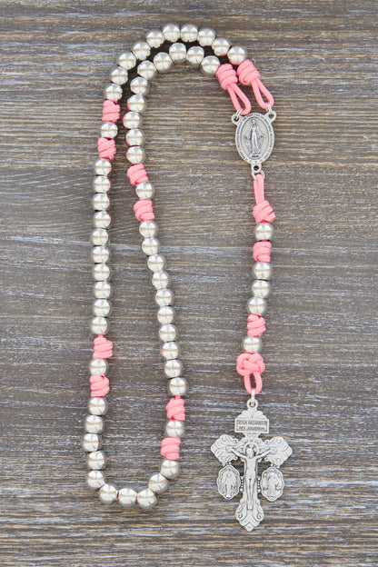 Divine Elegance premium metal paracord rosary with pink accents, shiny silver beads, and durable paracord 275.