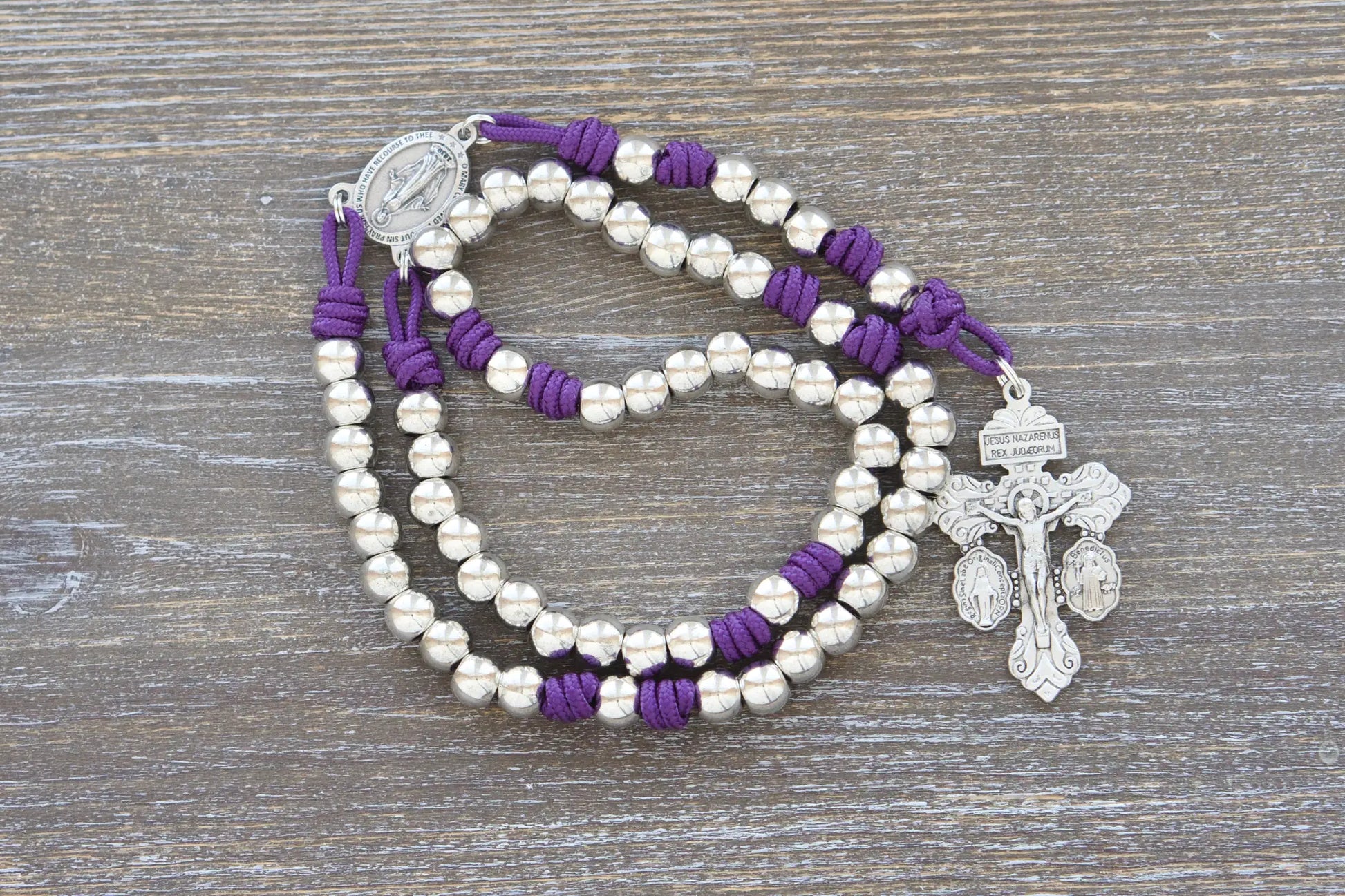 Divine Elegance premium metal paracord rosary with purple rope, shiny silver beads, and durable paracord 275.