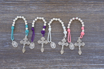 Divine Elegance pocket paracord rosary with silver metal beads, pardon crucifix and miraculous medal, available in 4 colors.