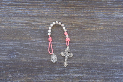 Divine Elegance premium metal paracord rosary with silver beads, crucifix, and medal in 4 colors.