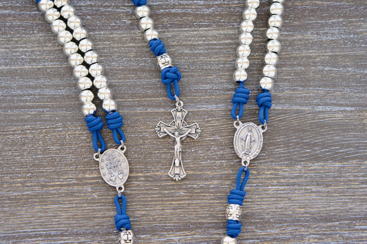 Divine Radiance Premium Metal Paracord Rosary: Sparkling silver 10mm beads, a Miraculous Medal centerpiece, and gleaming silver Crucifix on durable paracord. Handmade by a Catholic family.